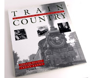 модель Железнодорожные модели 16403-85 Книга Train Country: An Illustrated History of Canadian National Railways. Автор Donald MacKay. Описание в оригинале: <i>This giant book illustrates the history of the Canadian National Railway ("World’s Greatest Travel System") created after World War I with a combination of resources from five financially troubled railroads. Canadian National played a central role in the population growth of the more remote northern areas of Canada, moved passengers between major cities in style, and was instrumental in the movement of goods both to market and to the country’s smaller towns. The story is told by engineers, porters, signalmen and others in this 192-page softcover volume. A truly beautiful book!</i> 192 стр. Издатель: Heimburger House Publishing Co. ISBN-10: 0911581375. ISBN-13: 978-0911581379. Мягкая обложка. На английском языке. 